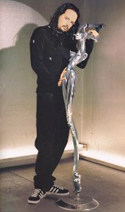 Jonathan Davis of Korn with his microphone stand designed by Giger